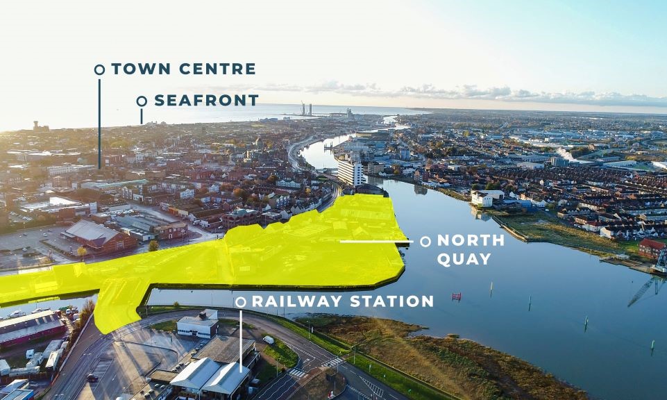 Oblique aerial photo with yellow overlay outlining the North Quay site area