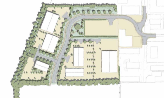 Oblique aerial photo of site including a large building surrounded by a carpark, with perimeter of area outlined in orange